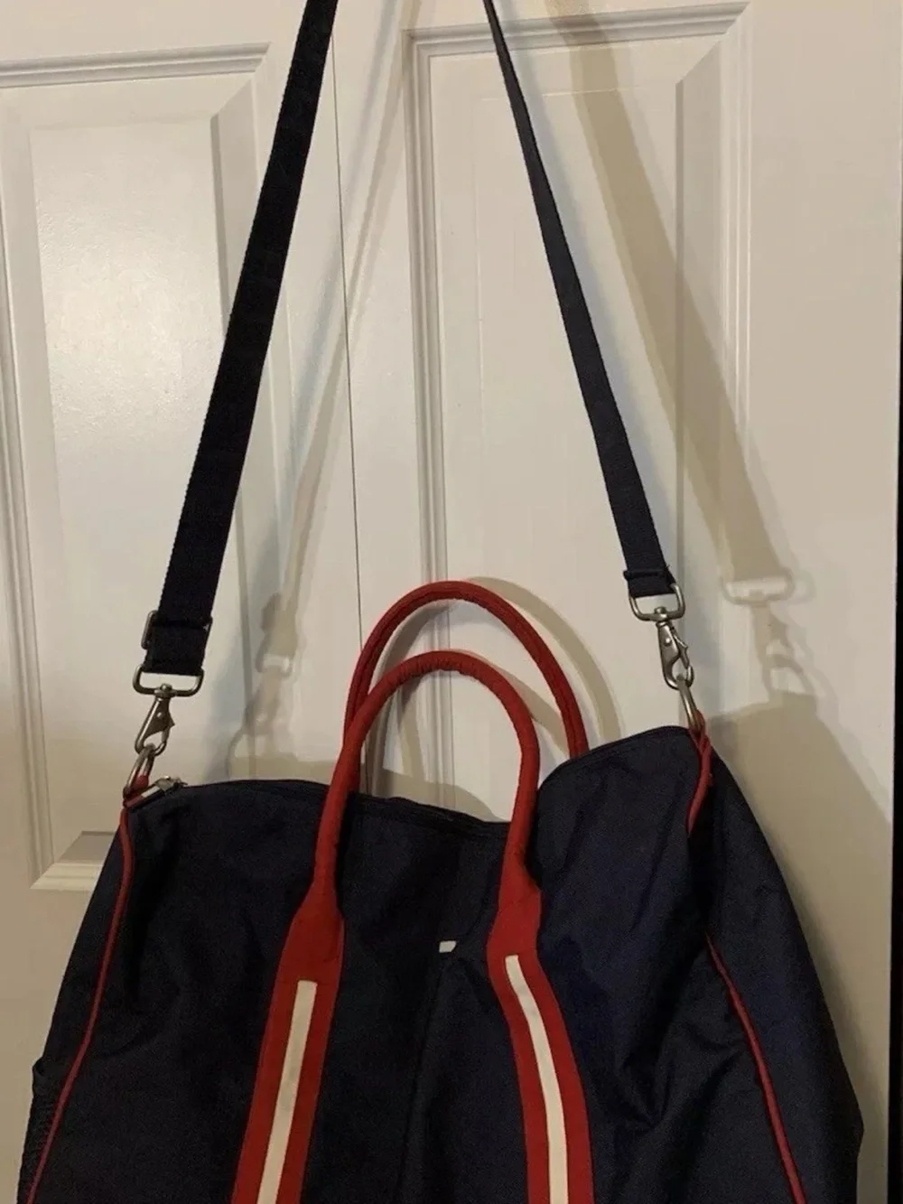 Tommy Hilfiger Navy Duffel with Red Piping and Branded Strap